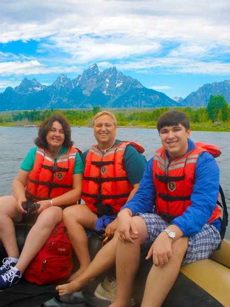 Trip (64).jpg - Sharon, Ken and Kris rafting on the Snake River with the Grand Tetons in the background.